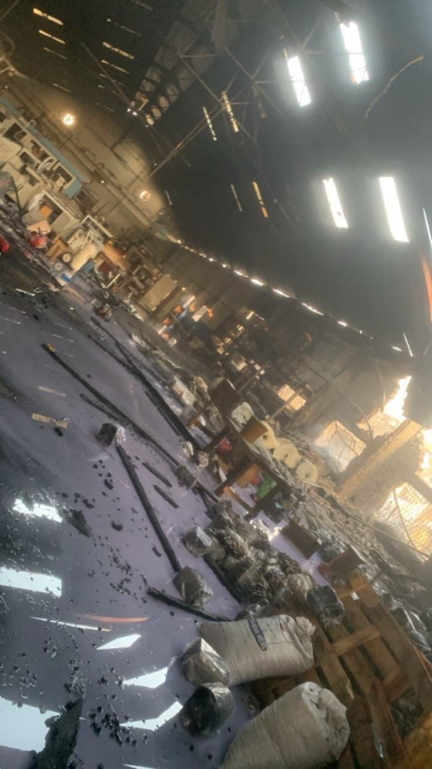 Fire Guts Warehouse Holding Rubber Products in Tema Industrial Area